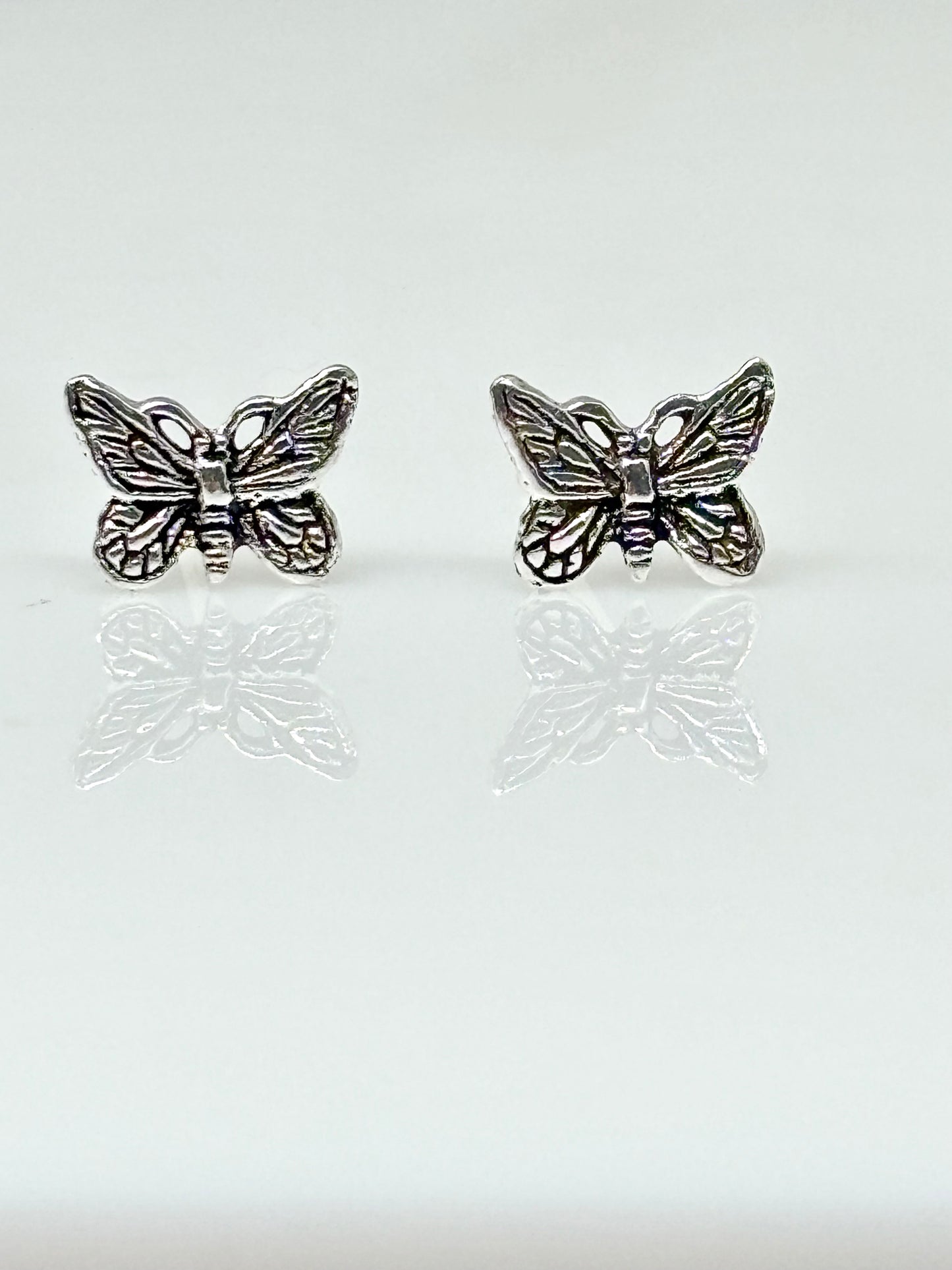 Silver butterfly ear studs from Pixi Daisy