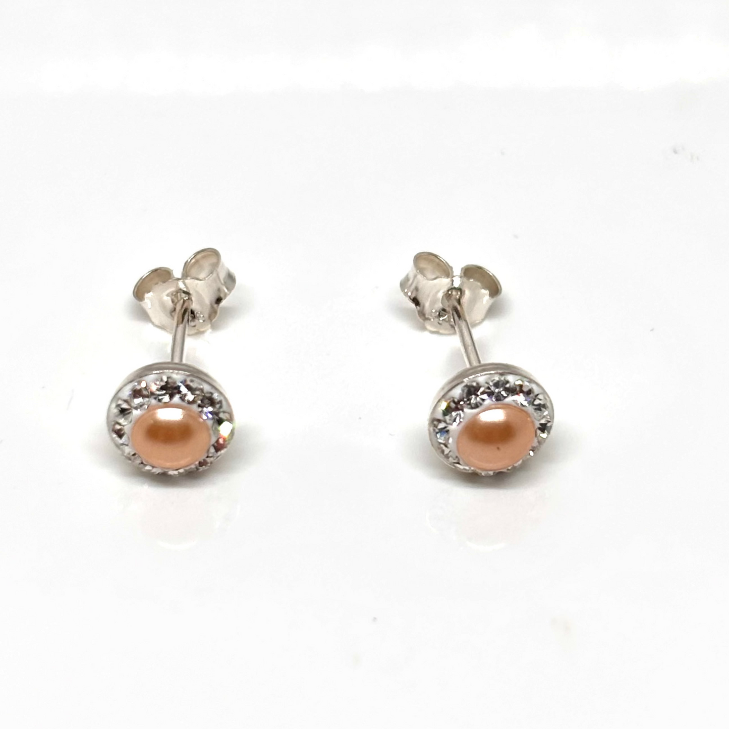 Pair of pearl earrings within a crystal setting from Pixi Daisy