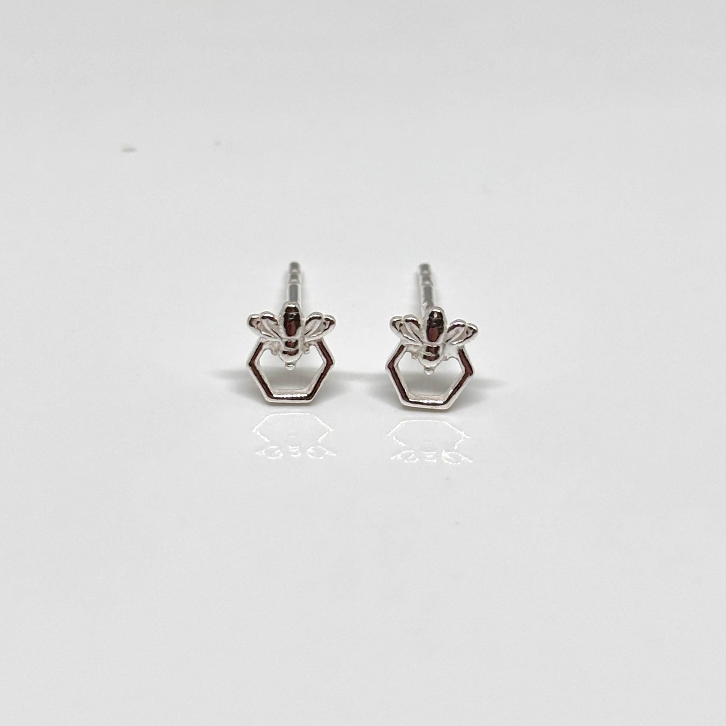 Silver bee-shaped earrings from Pixi Daisy