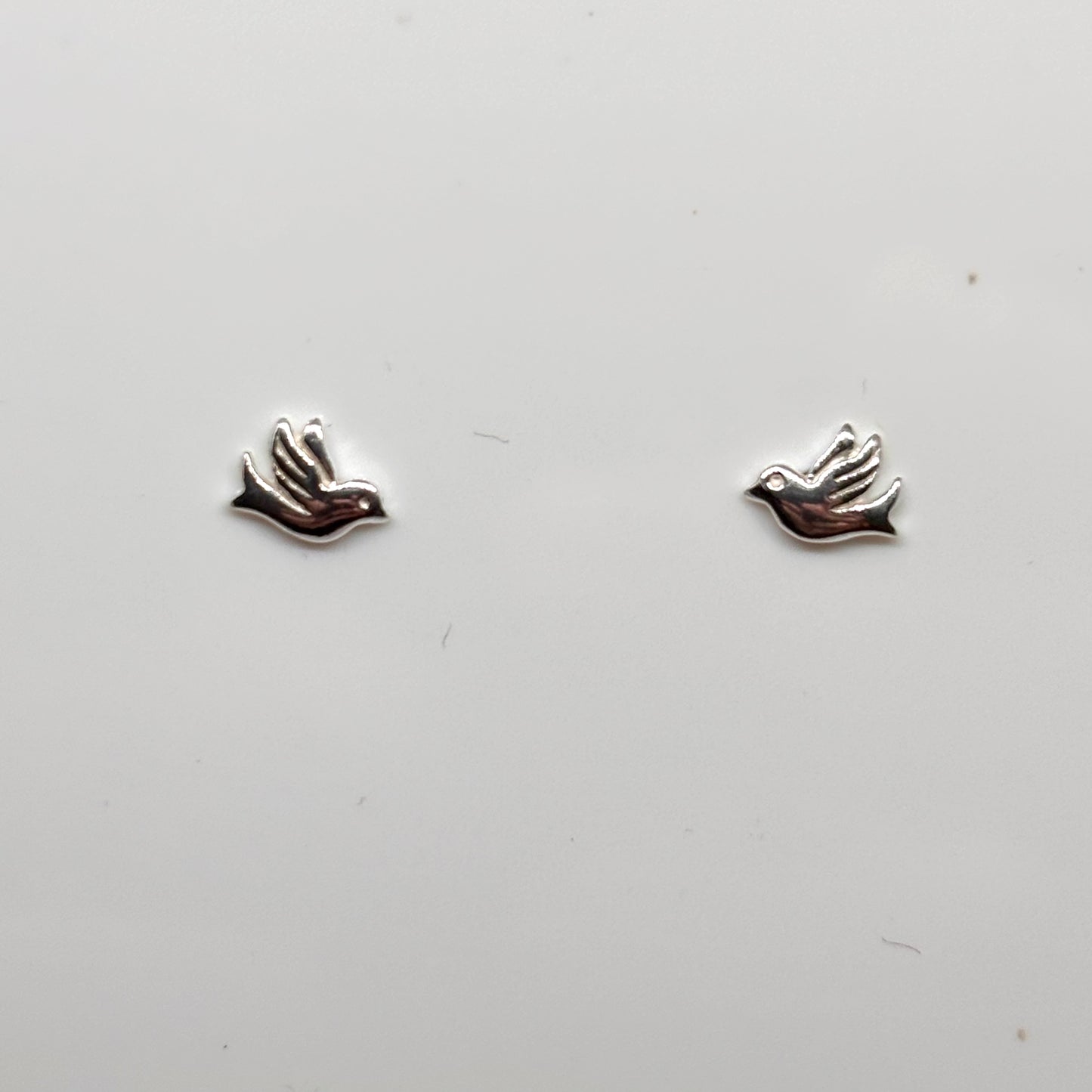 Silver bird-shaped earrings from Pixi Daisy