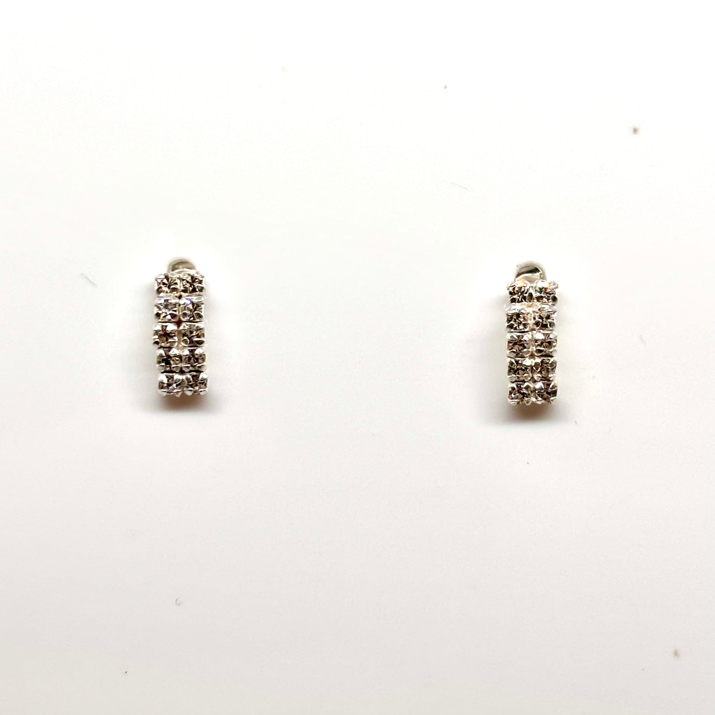 Pair of silver stud earrings with small crystals from Pixi Daisy