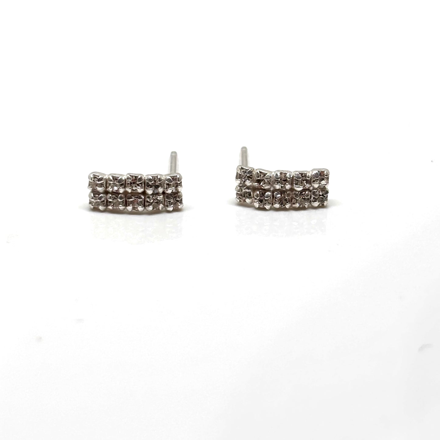 Pair of silver stud earrings with small crystals from Pixi Daisy