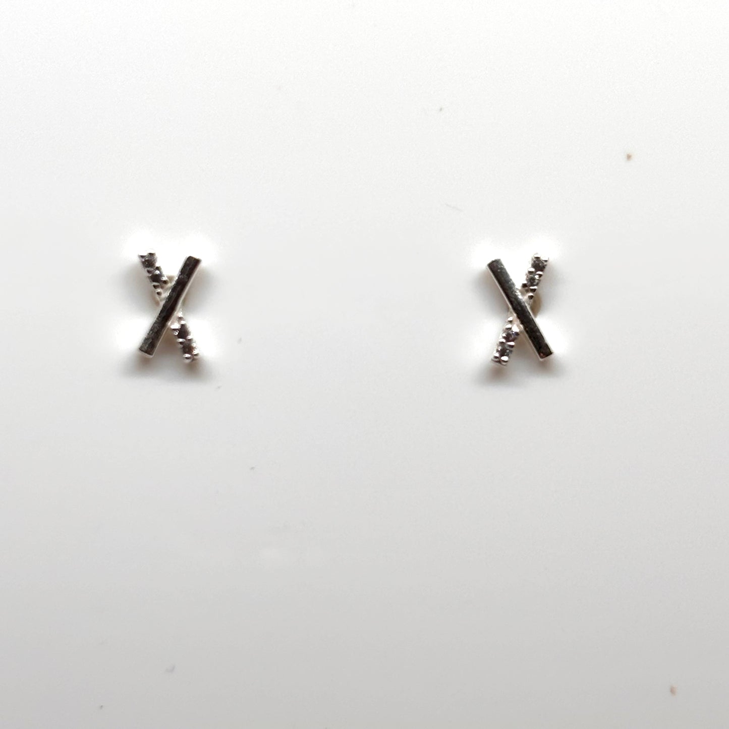 Cross ear studs with embedded crystals from Pixi Daisy