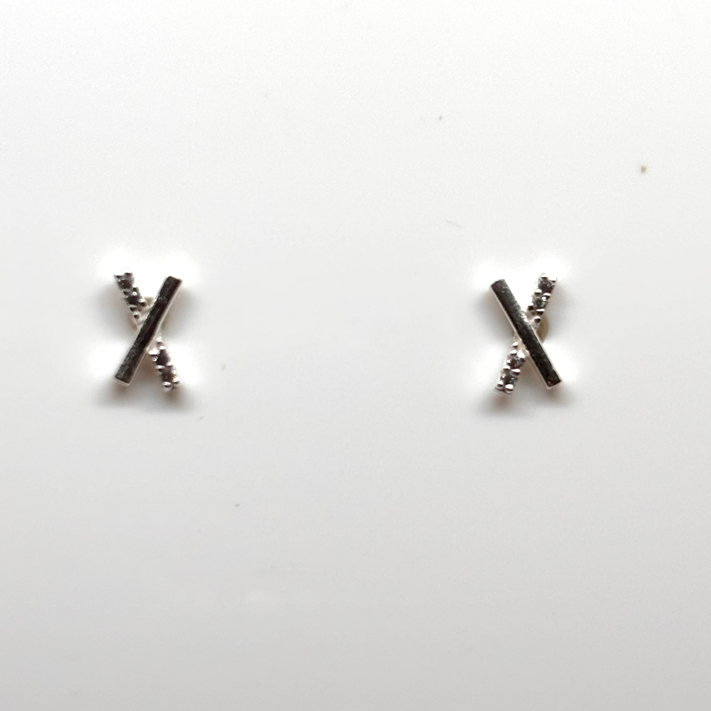 Cross ear studs with embedded crystals from Pixi Daisy