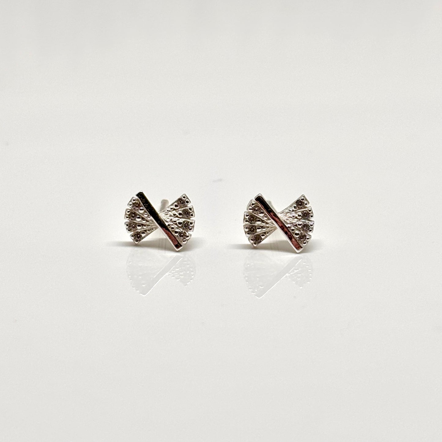 Silver bow ear studs from Pixi Daisy