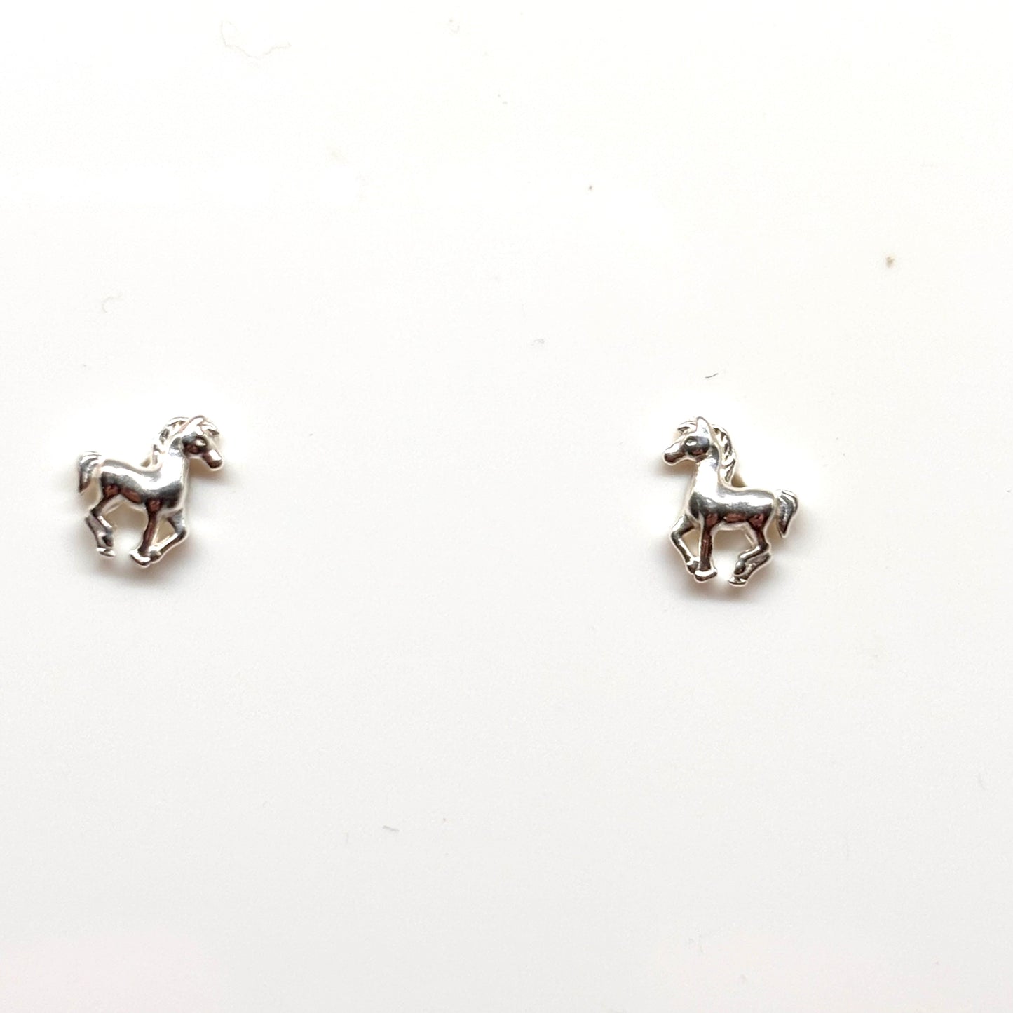 Silver horse ear studs from Pixi Daisy