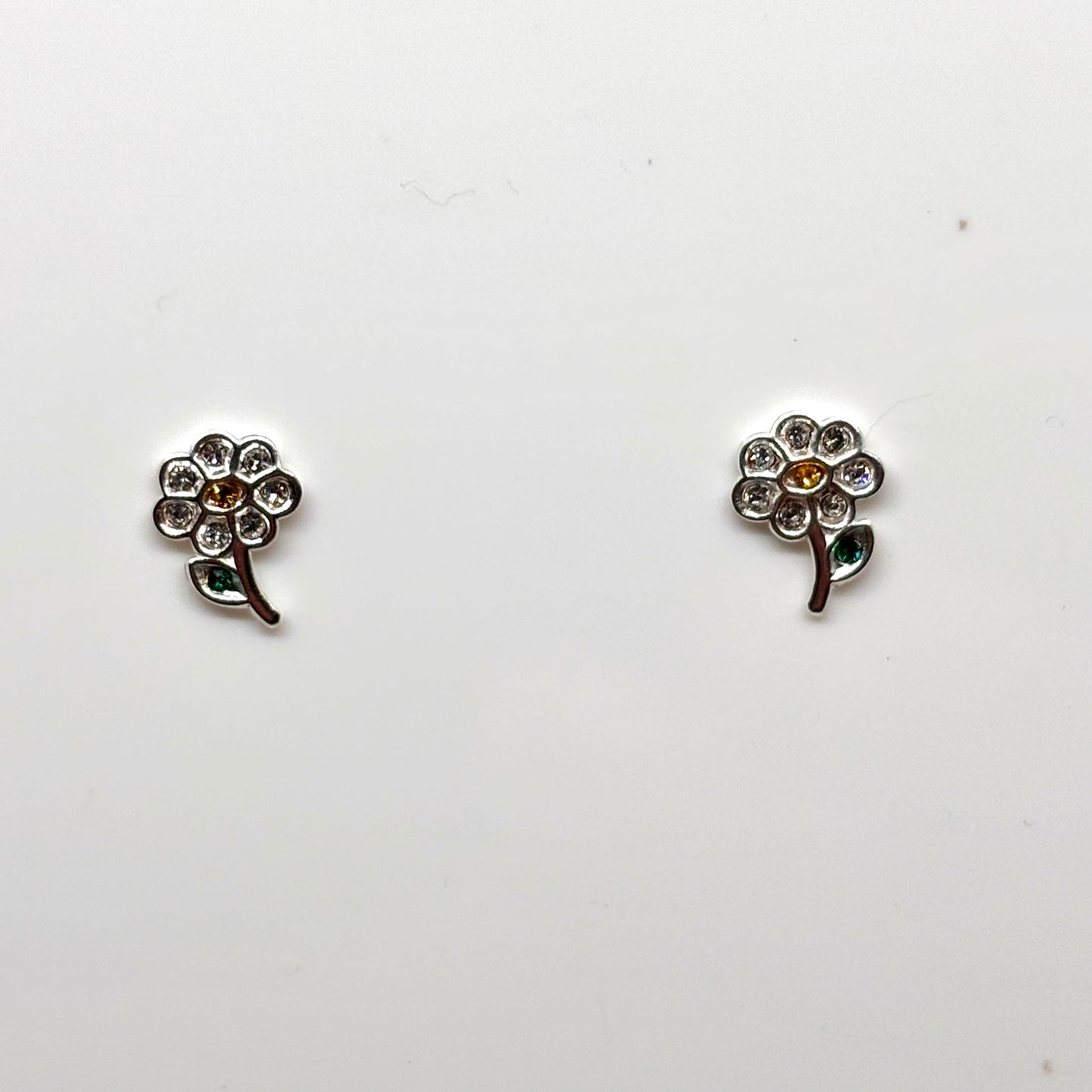 Silver flower earrings with embedded crystals from Pixi Daisy