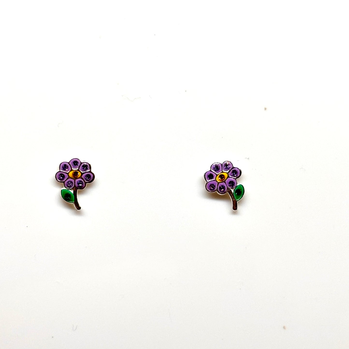 Silver flower earrings with embedded crystals from Pixi Daisy