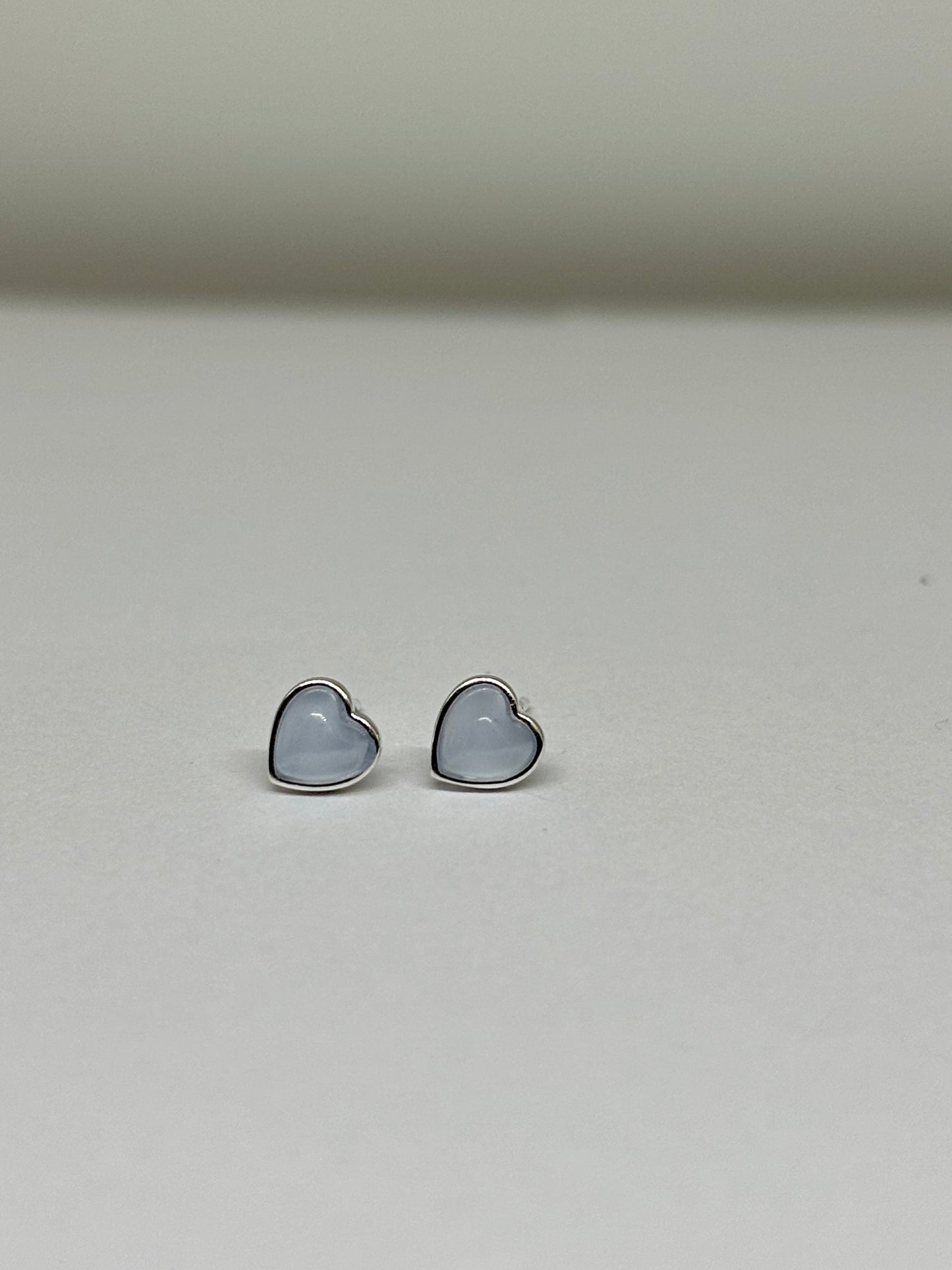 Pale blue heart shaped ear studs from Pixi Daisy