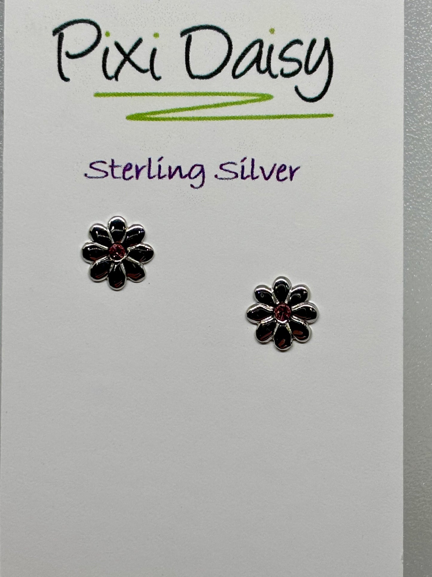silver flower ear studs from pixi daisy