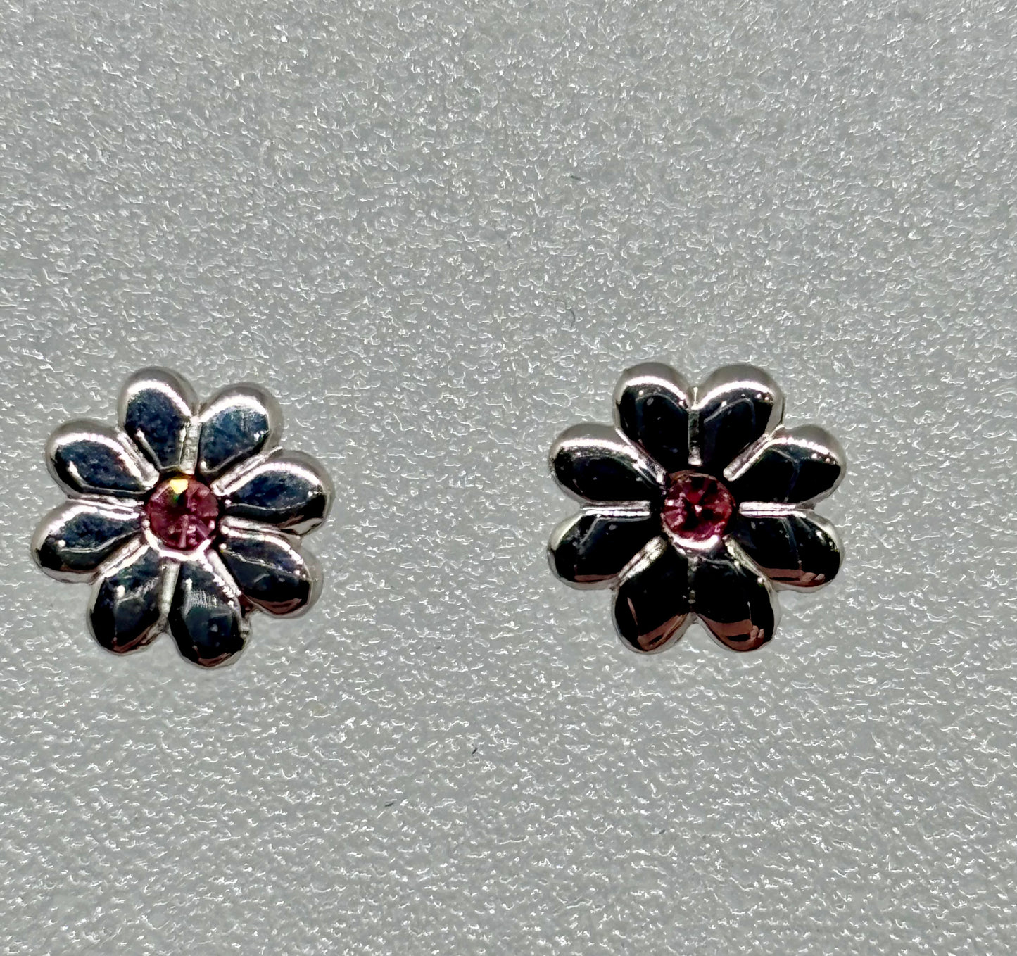 silver flower ear studs from pixi daisy