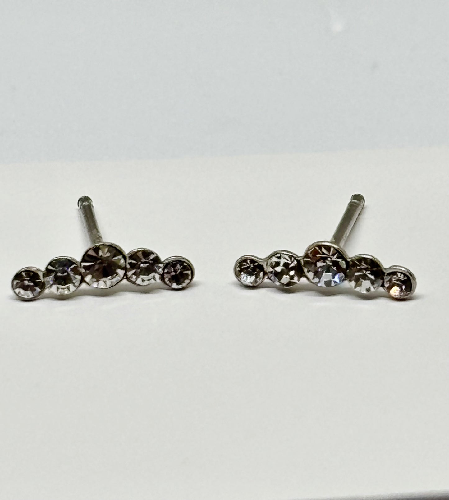 Curved sparkly crystal ear studs from Pixi Daisy