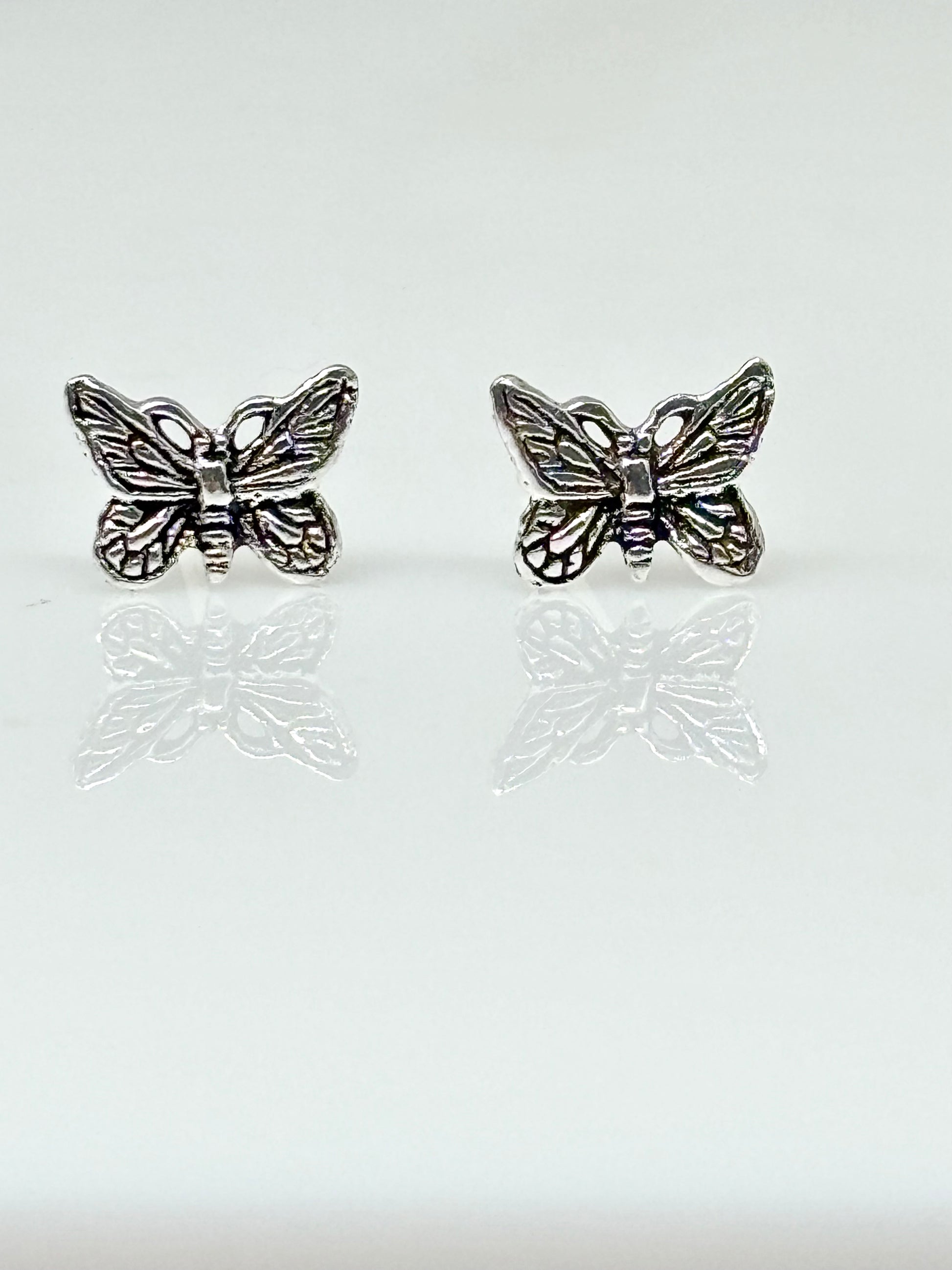 Silver butterfly ear studs from Pixi Daisy