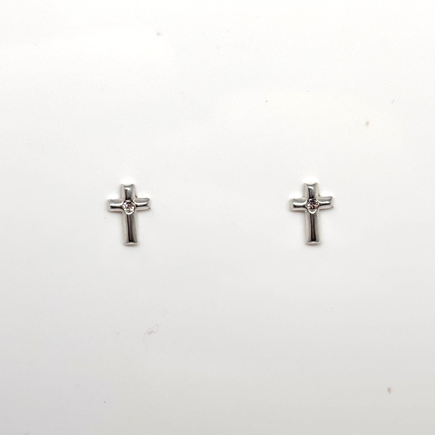 Silver cross ear studs from Pixi Daisy