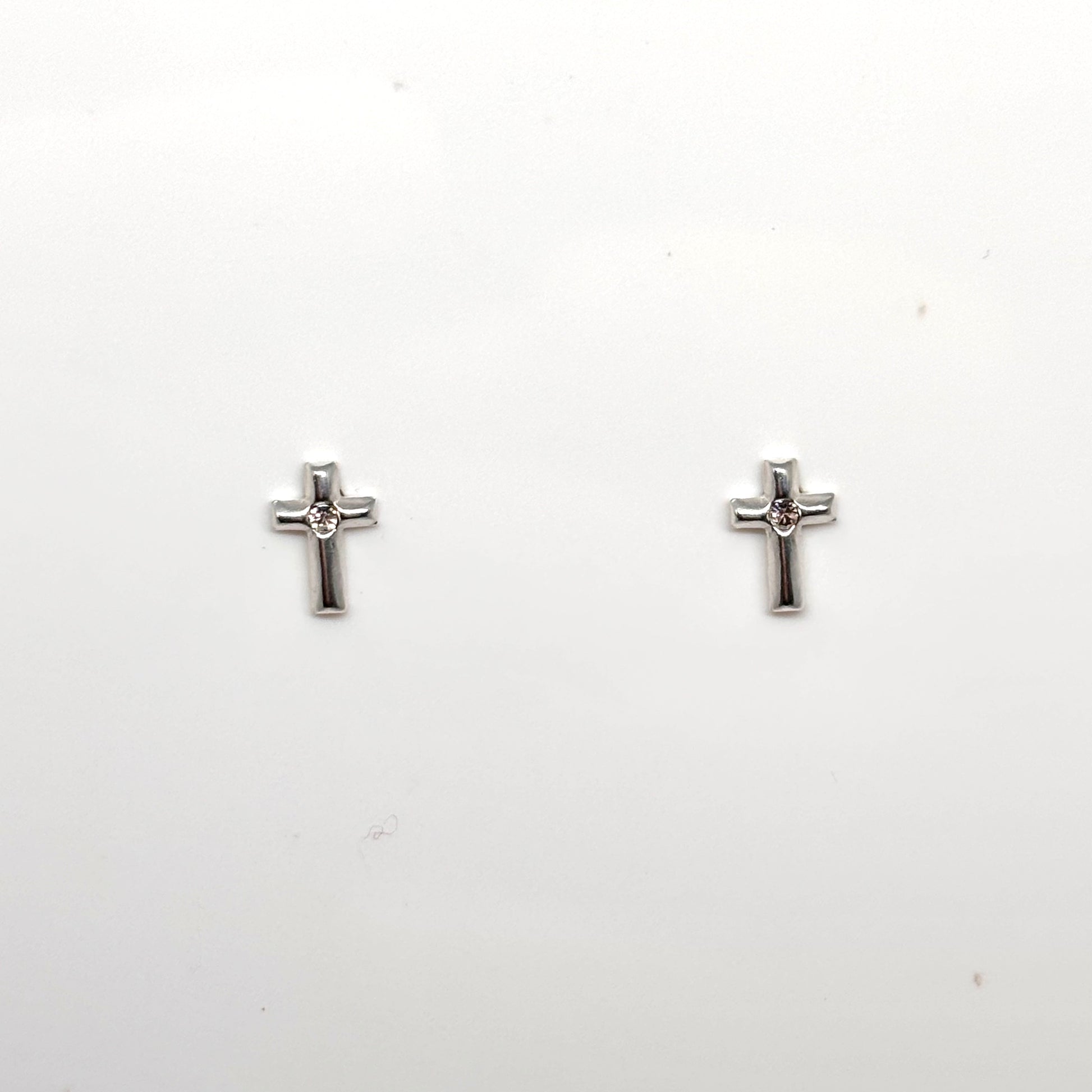 Silver cross ear studs from Pixi Daisy