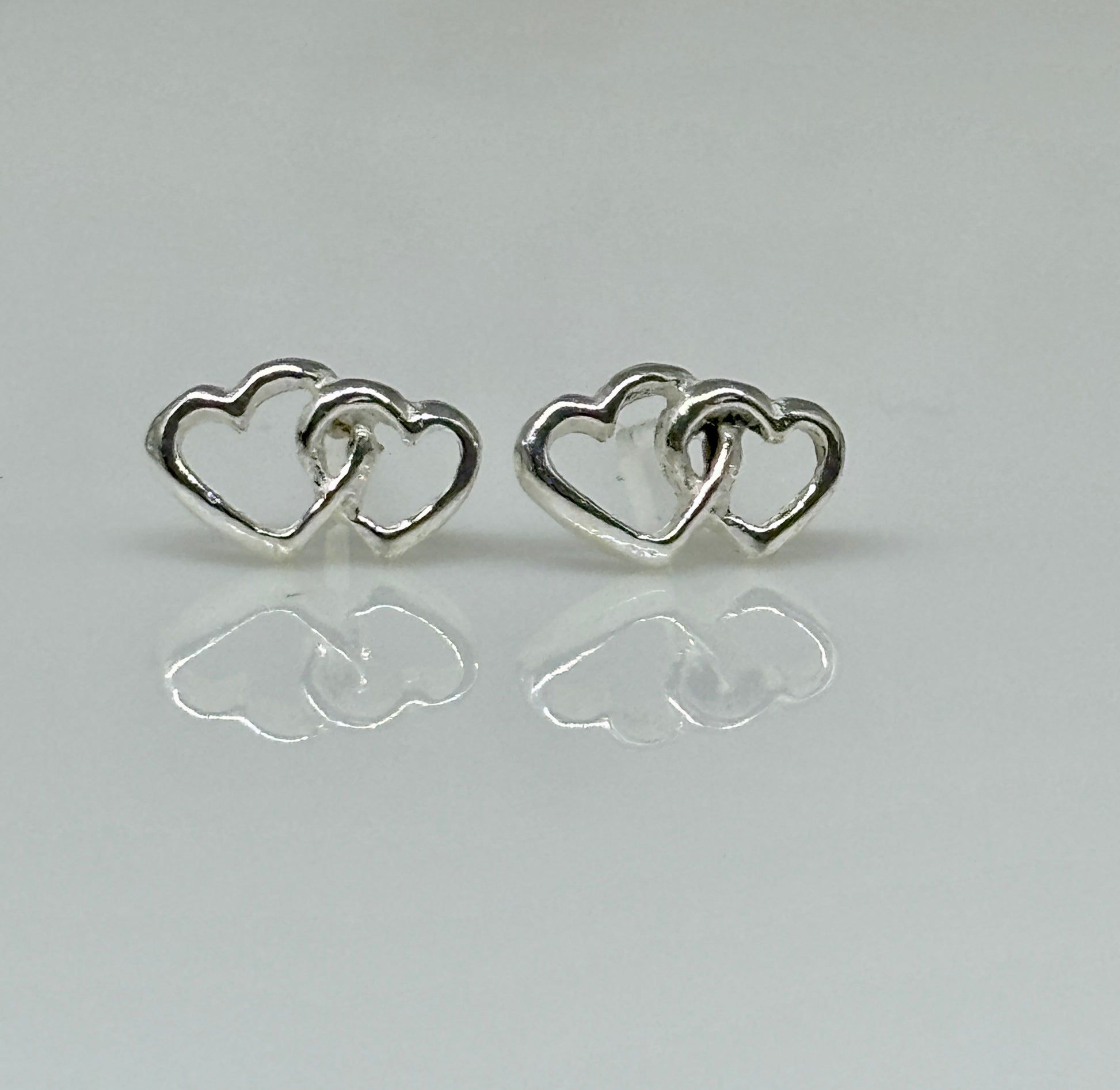 Double Heart Stud Earrings from Pixi Daisy