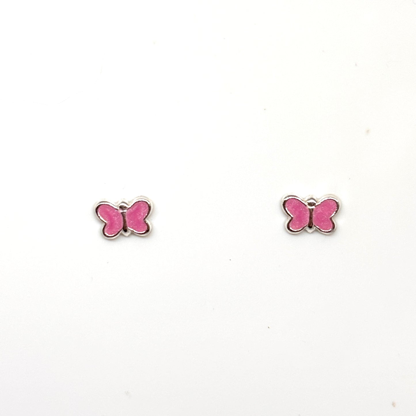 Pink butterfly-shaped earrings from Pixi Daisy