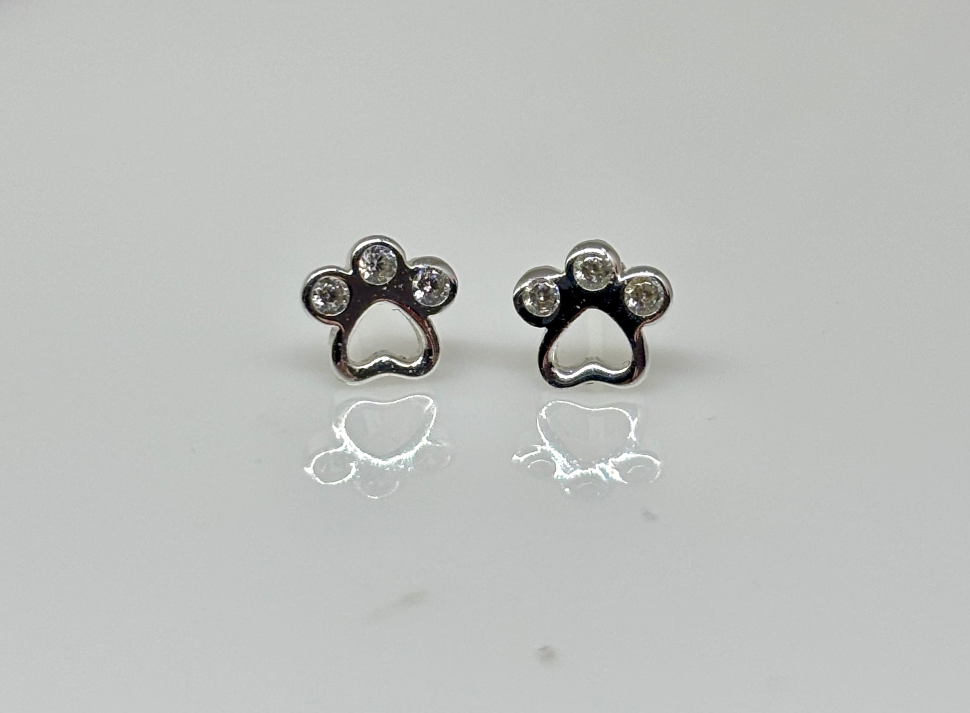 Crystal Paw Print Ear Studs from Pixi Daisy