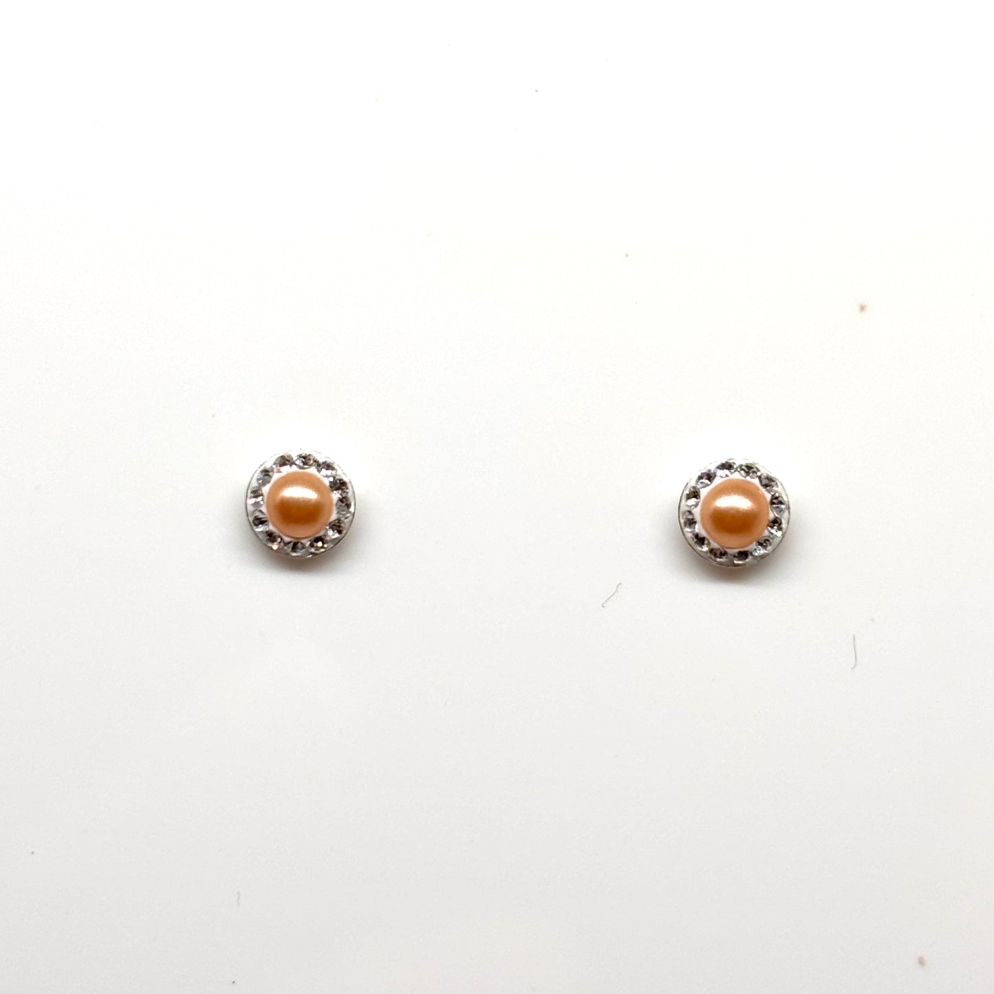 Pair of pearl earrings within a  crystal setting from Pixi Daisy