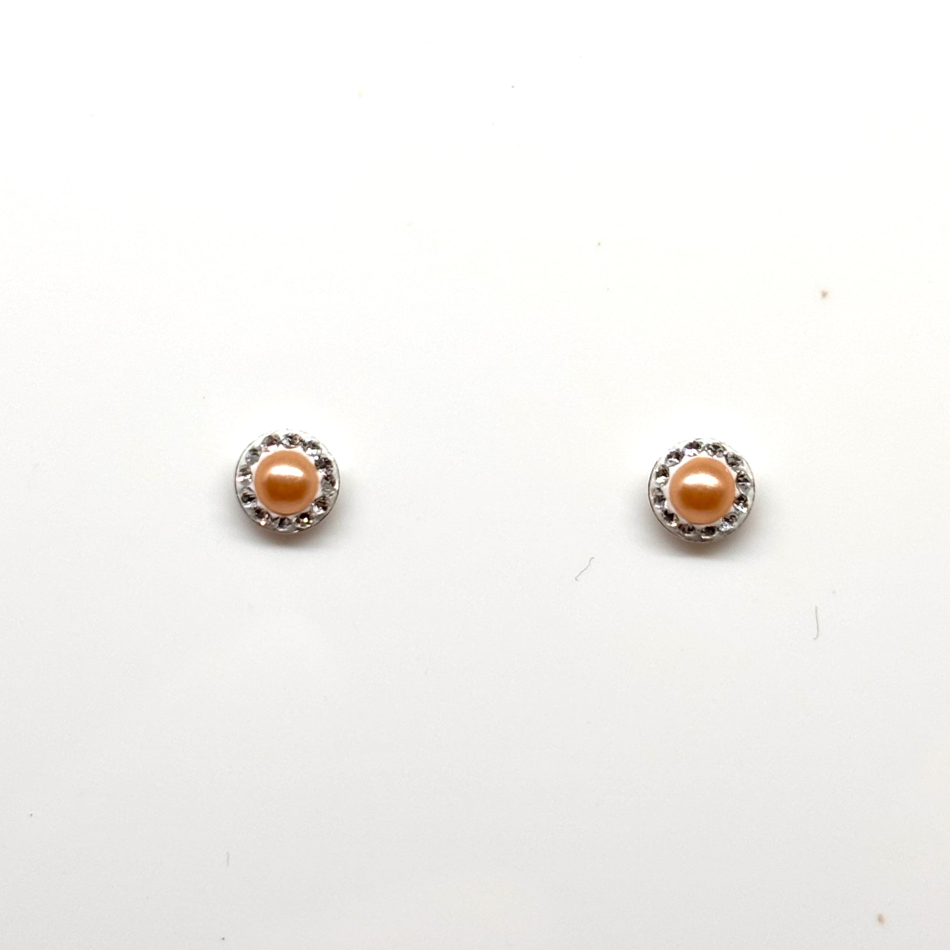 Pair of pearl earrings within a  crystal setting from Pixi Daisy