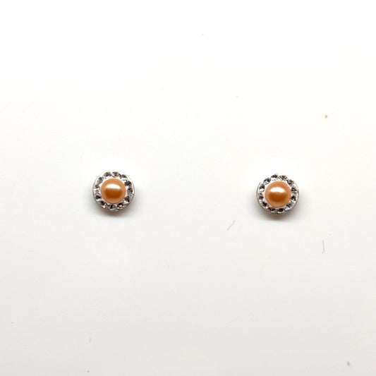 Pair of pearl earrings within a  crystal setting from Pixi Daisy
