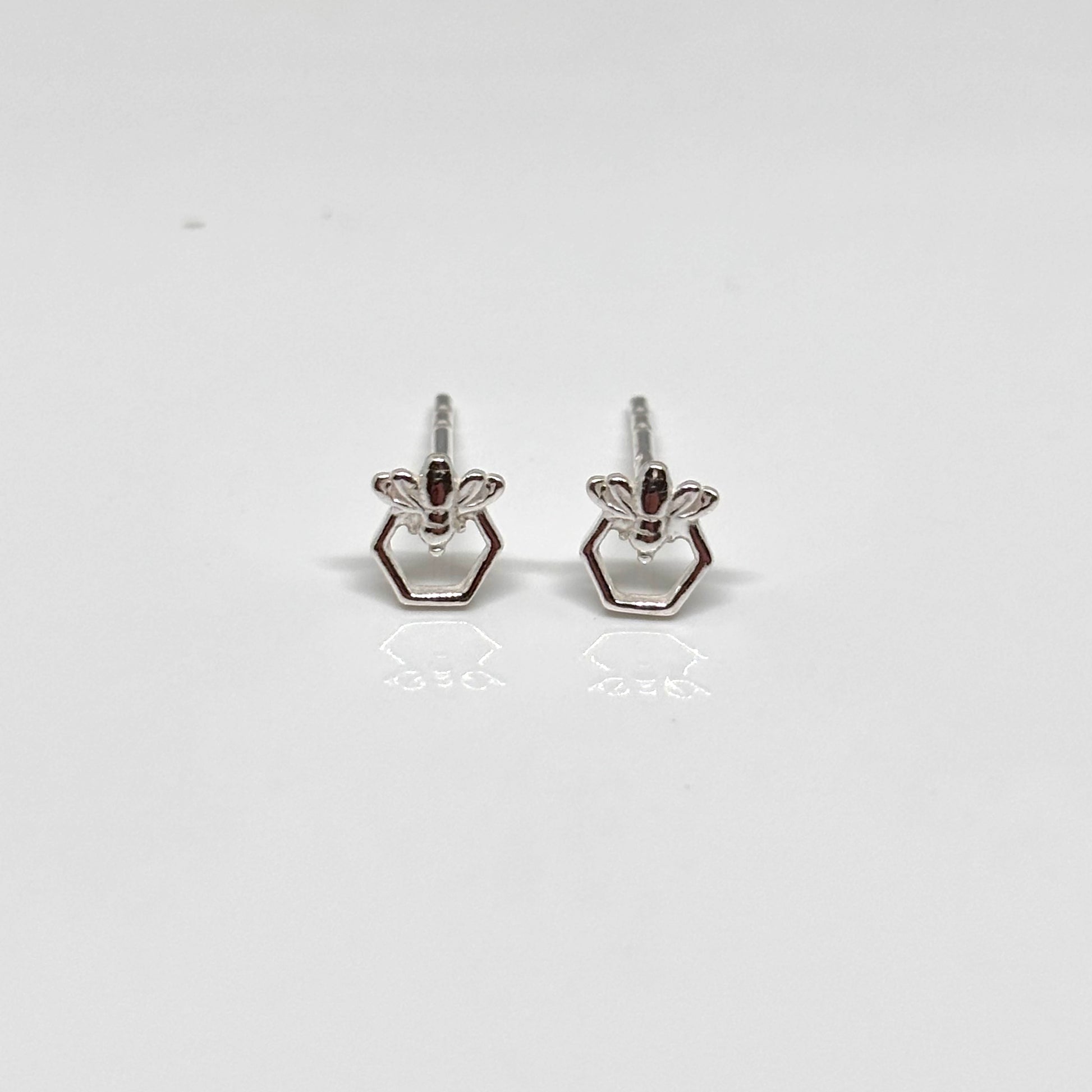 Silver bee-shaped earrings from Pixi Daisy