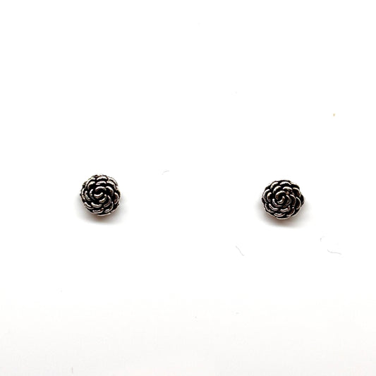Pair of silver rose-shaped earrings from Pixi Daisy