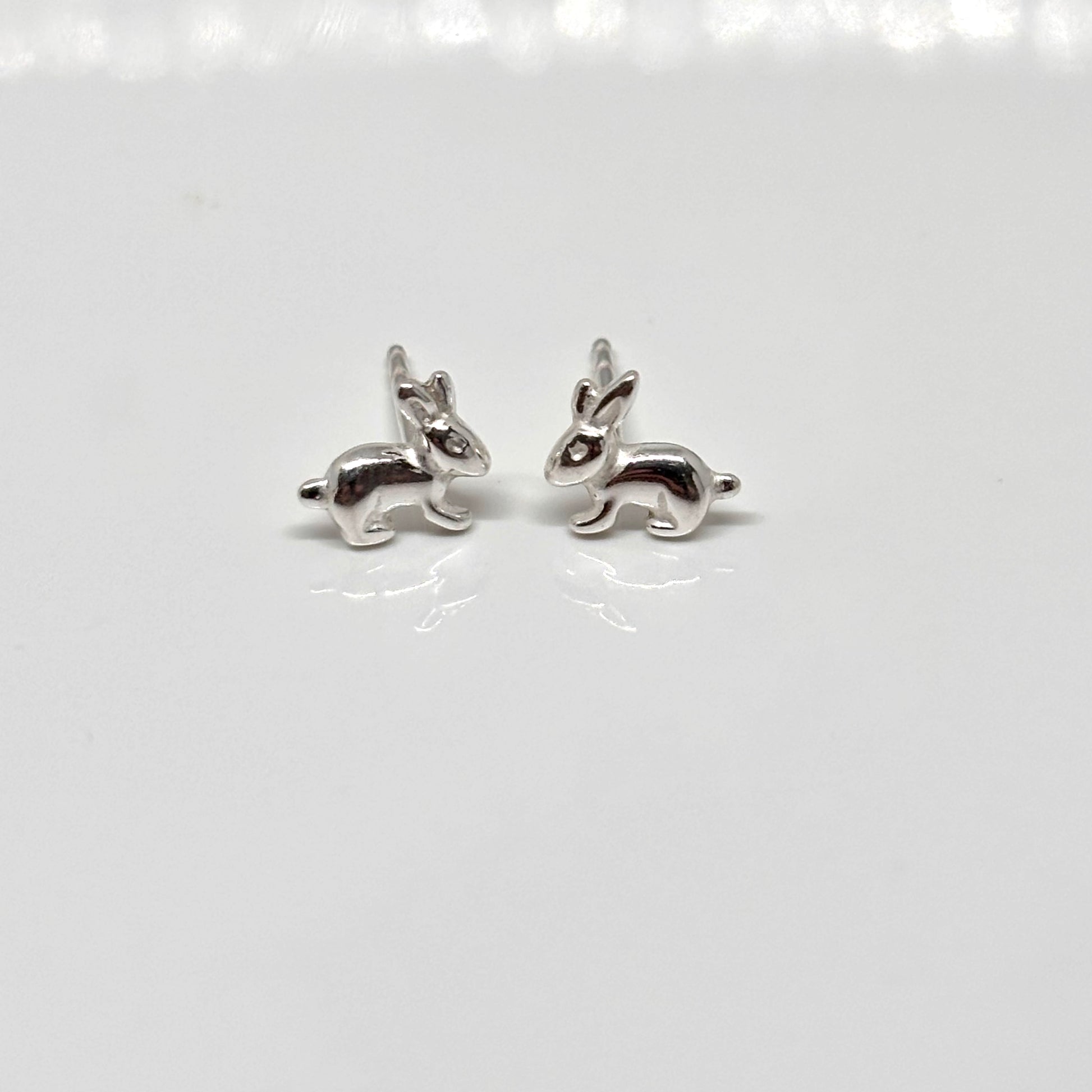 Pair of silver rabbit-shaped earrings from Pixi Daisy