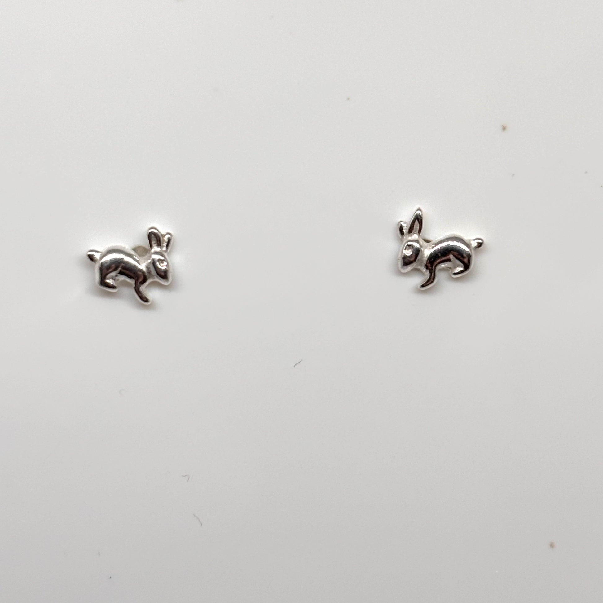 Pair of silver rabbit-shaped earrings from Pixi Daisy