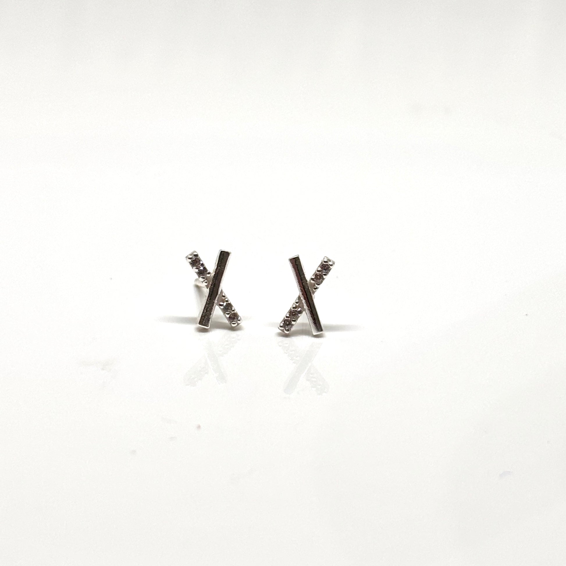 Cross ear studs with embedded crystals from Pixi Daisy