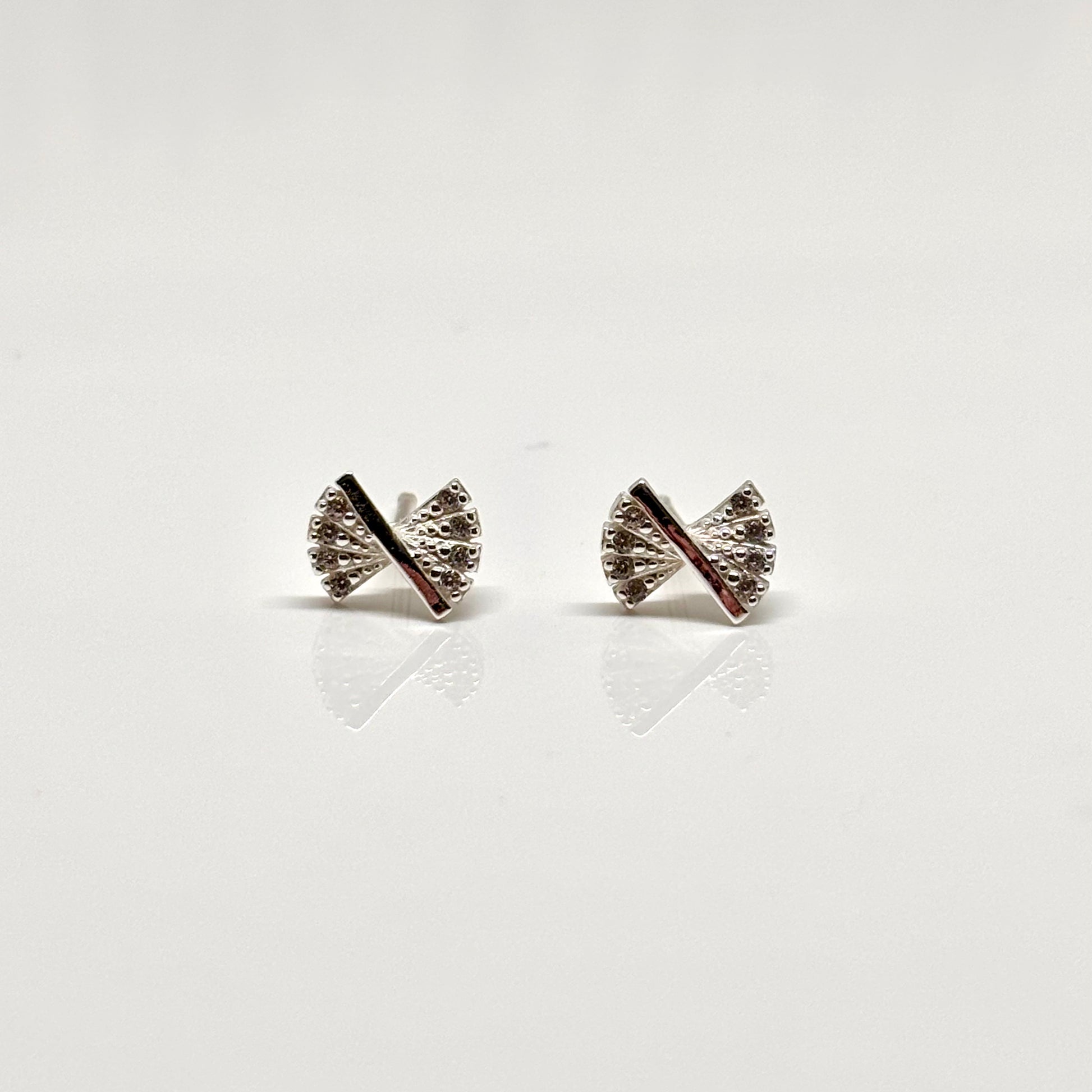 Silver bow ear studs from Pixi Daisy