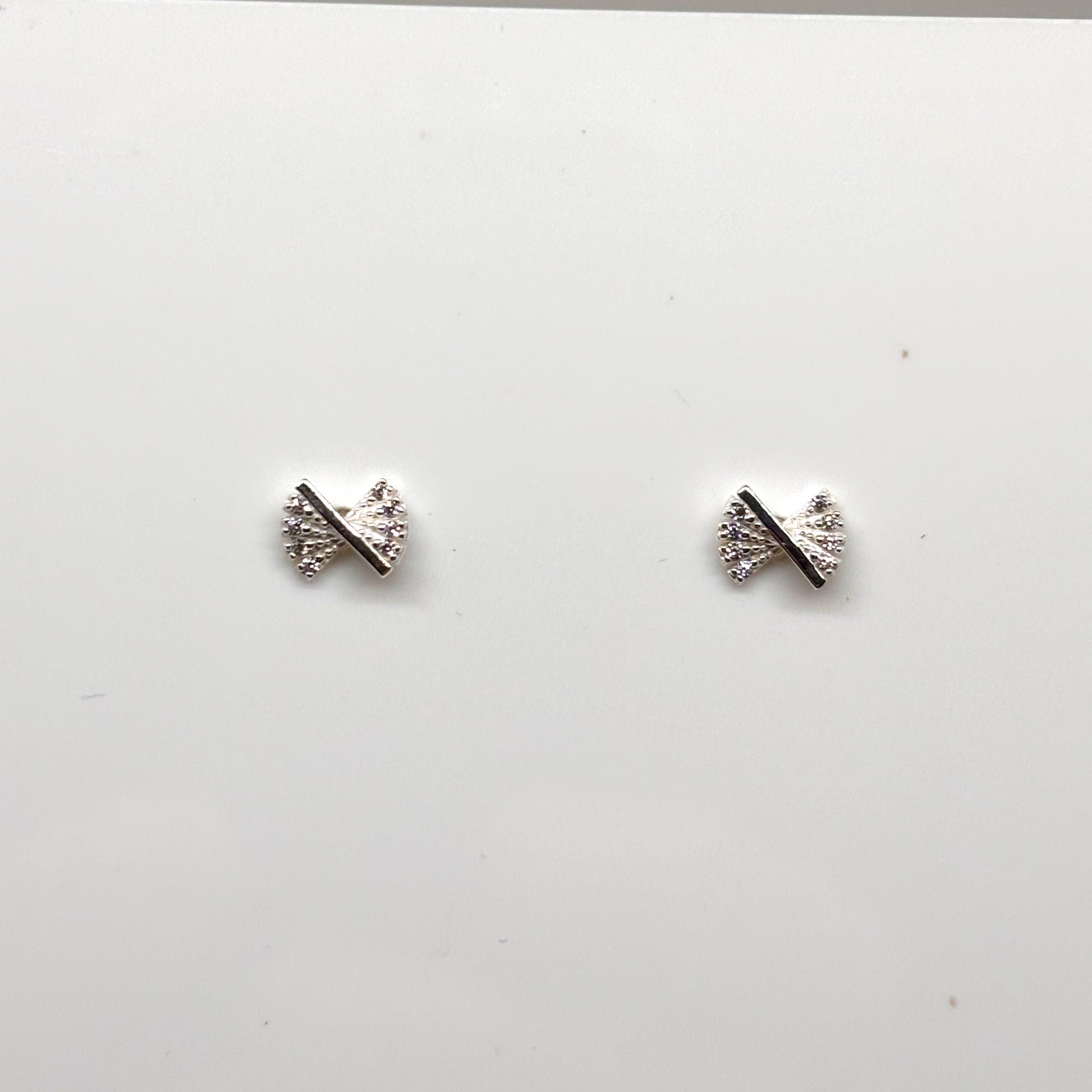 Silver bow ear studs from Pixi Daisy