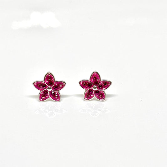 Pair of pink flower-shaped earrings from Pixi Daisy
