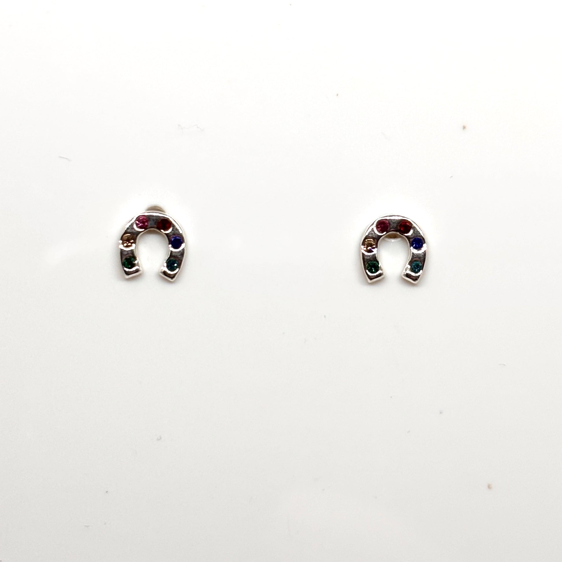 Pair of silver horseshoe-shaped earrings with colourful stones from Pixi Daisy