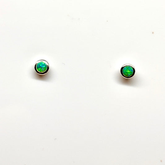Small bright green opal stud earrings from Pixi Daisy