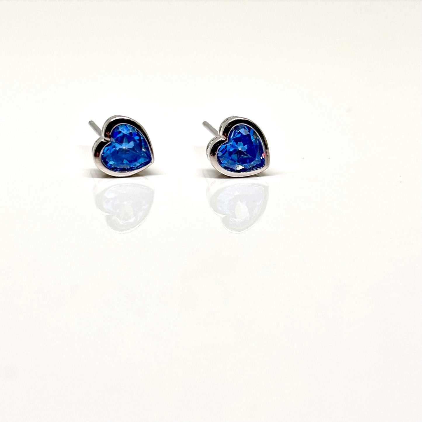 Blue crystal heart ear studs from Pixi Daisy