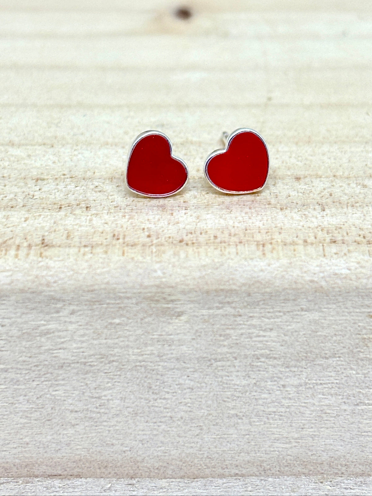red enamel heart ear studs from pixi daisy
