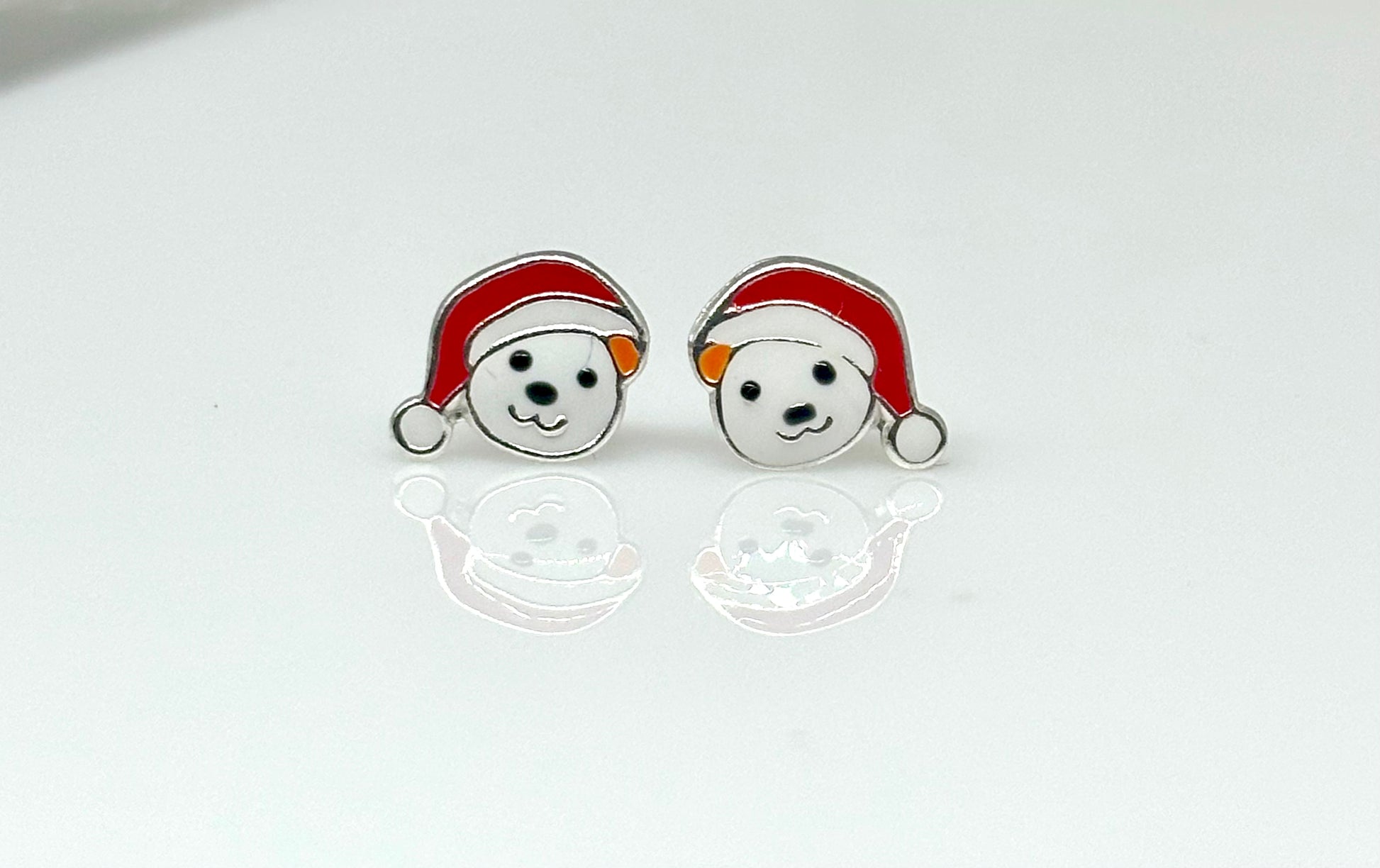 Bear & Santa Hat Sterling Silver Ear Studs from Pixi Daisy