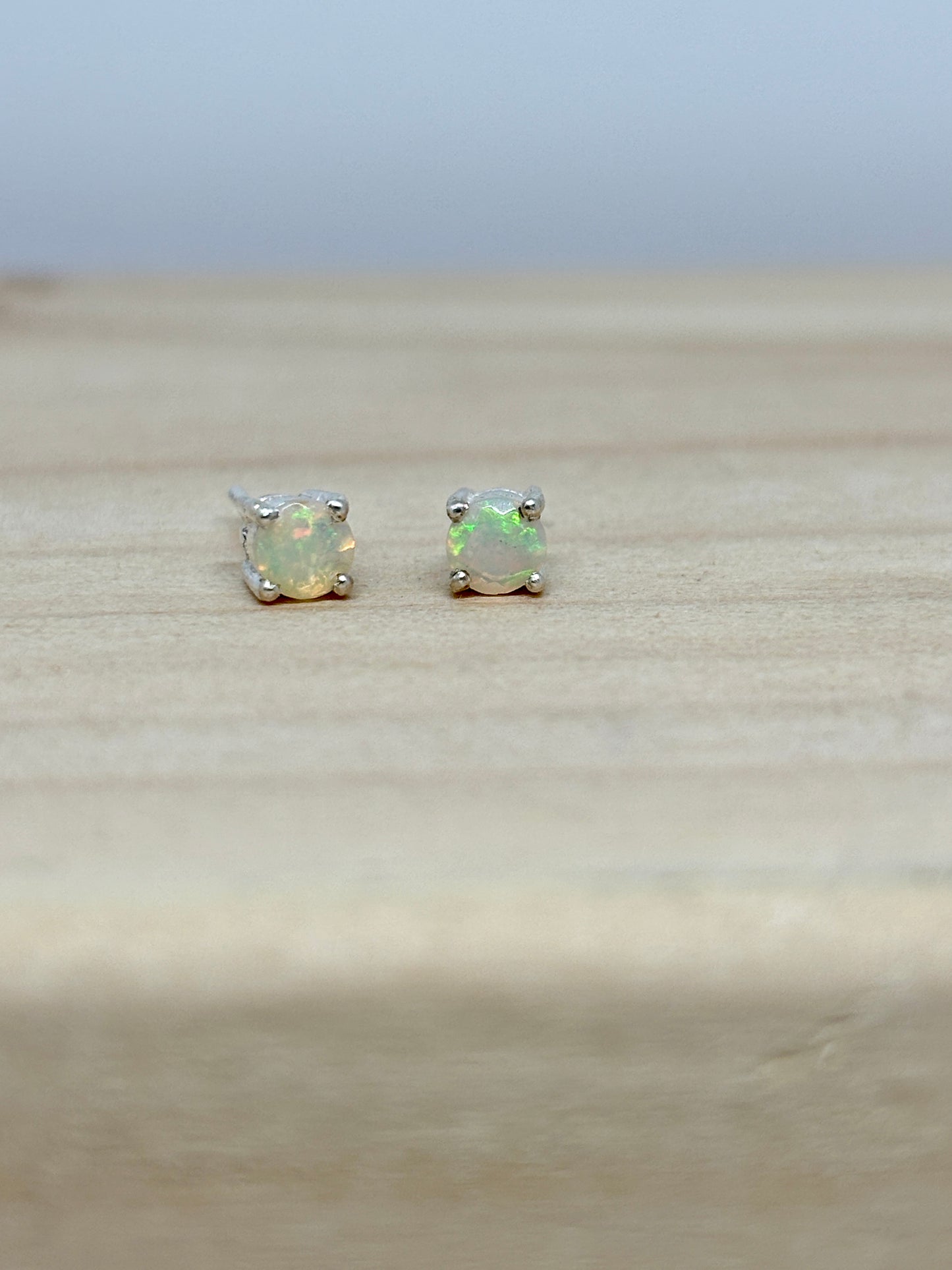 white Ethiopian opal ear studs - pixi daisy