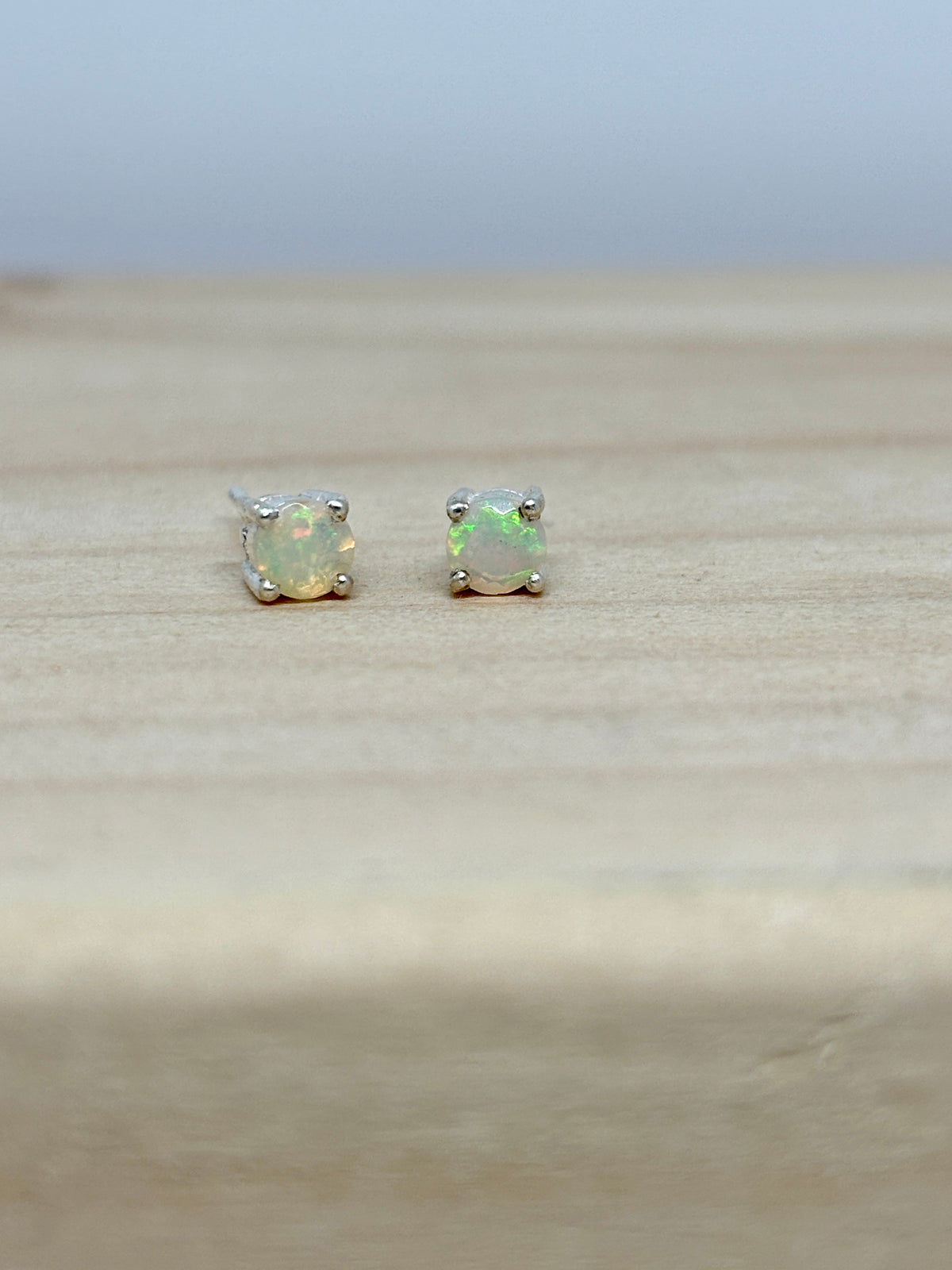 white Ethiopian opal ear studs - pixi daisy