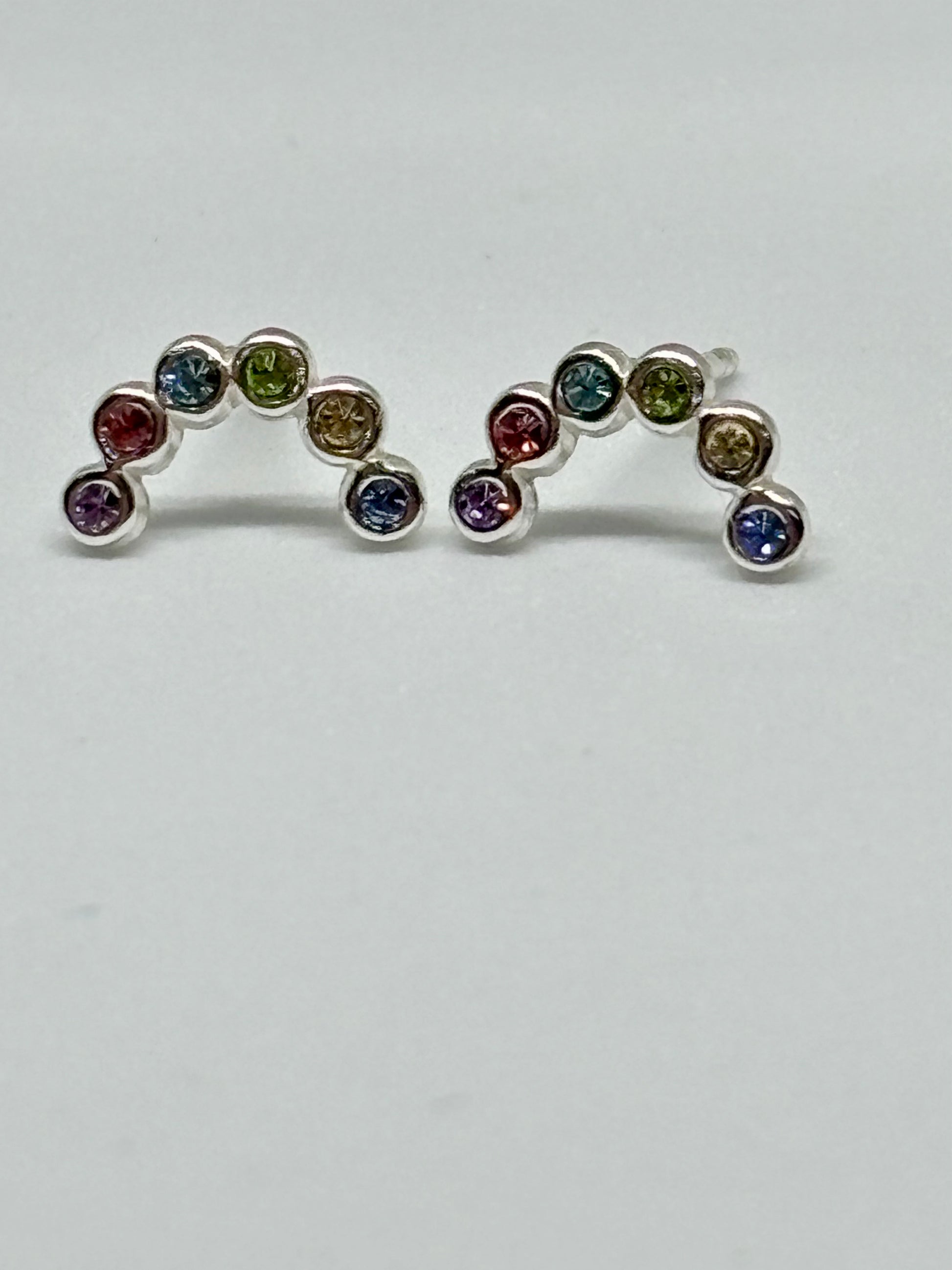 colourful crystal rainbow ear studs from Pixi Daisy