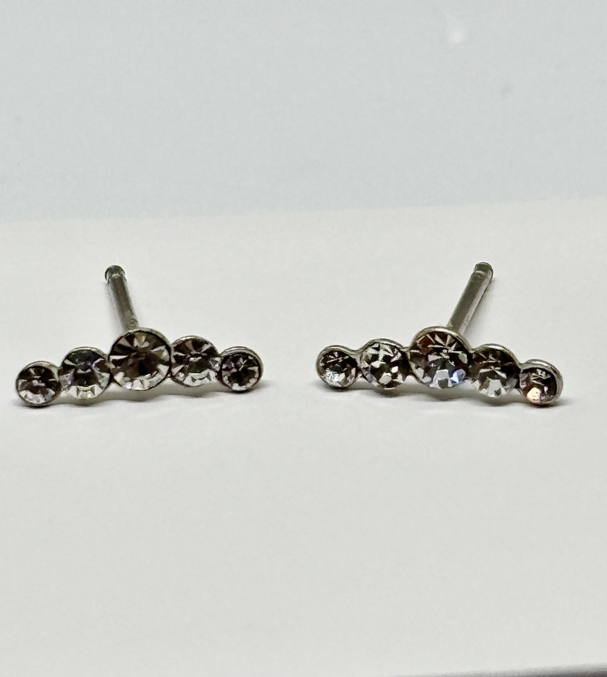 Curved sparkly crystal ear studs from Pixi Daisy