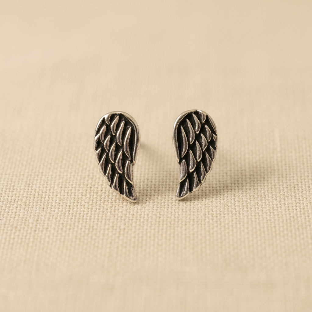 Angel Wings Sterling Silver Stud Earrings from pixi daisy
