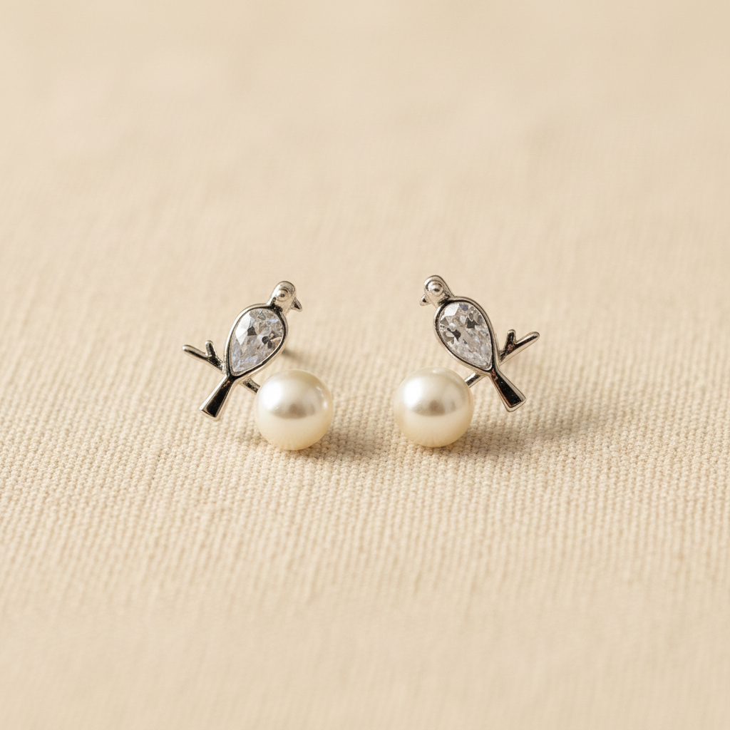 Bird and Pearl Stud Earrings from pixi daisy