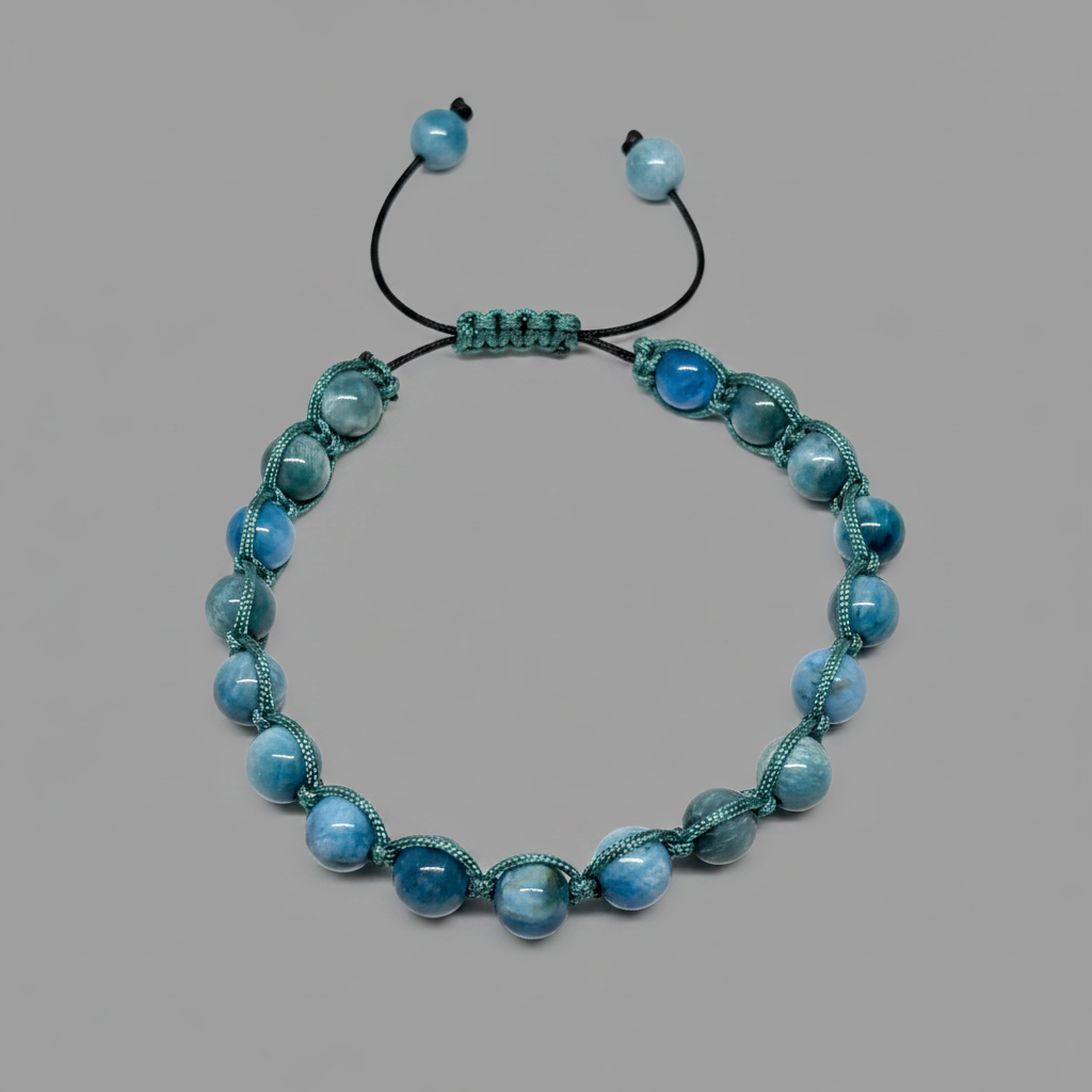 Blue apatite macrame bracelet flat lay slate grey