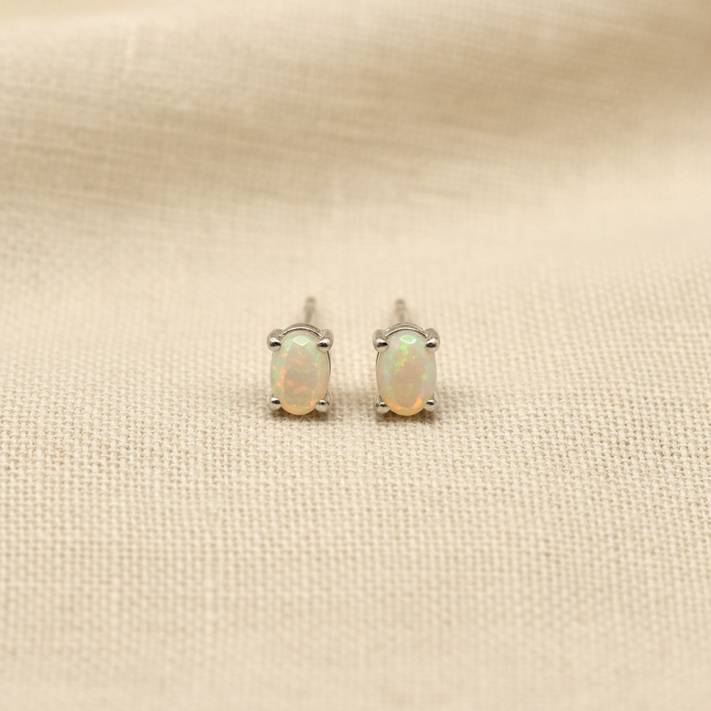 Oval White Opal Stud Earrings from pixi daisy