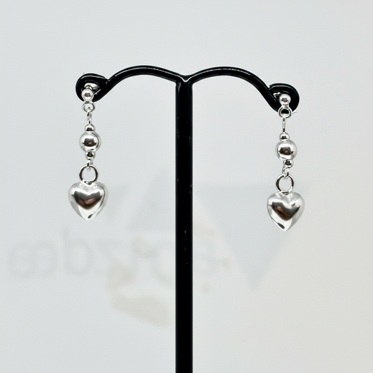 
Silver heart drop earrings from Pixi Daisy