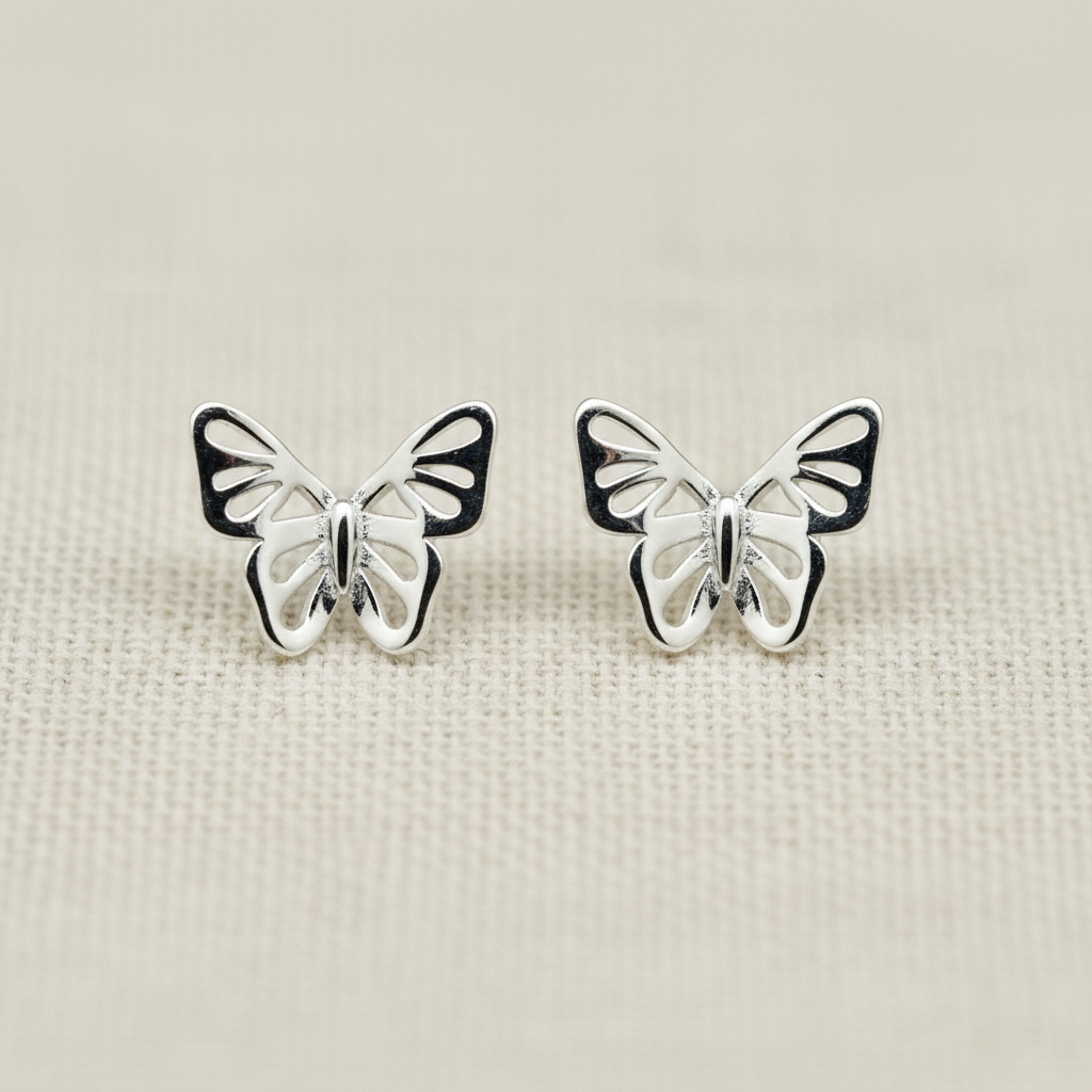 Silver Filigree Butterfly Stud Earrings from pixi daisy